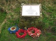 Memorial with several wreaths